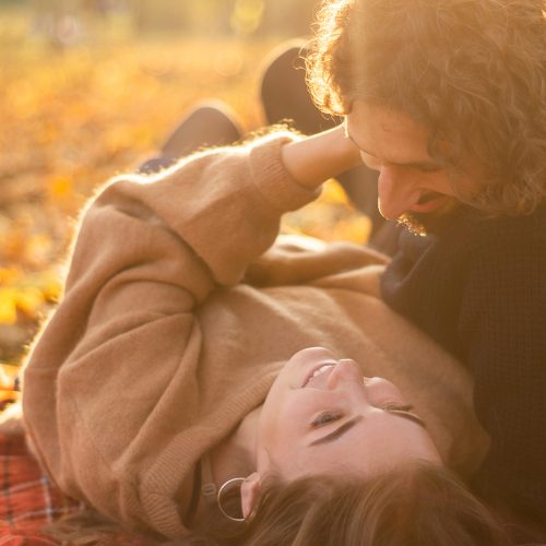 Happy couple outdoors. Outdoor portrait of romantic couple in love. Full of happiness. Valentines Day