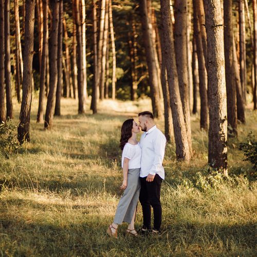 Young couple in love walking in the park