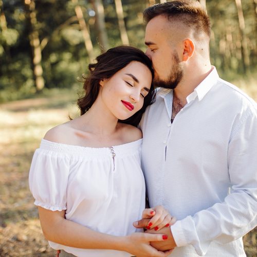 Young couple in love walking in the park
