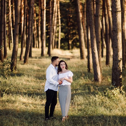 Young couple in love walking in the park