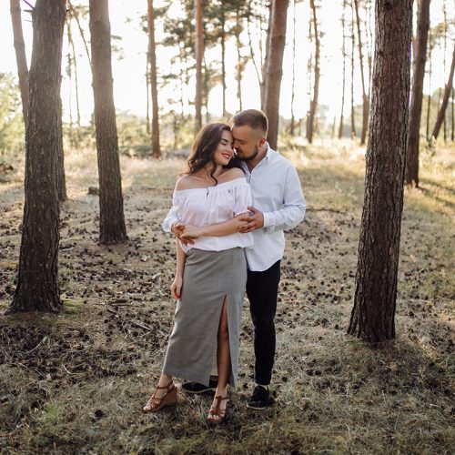 Young couple in love walking in the park